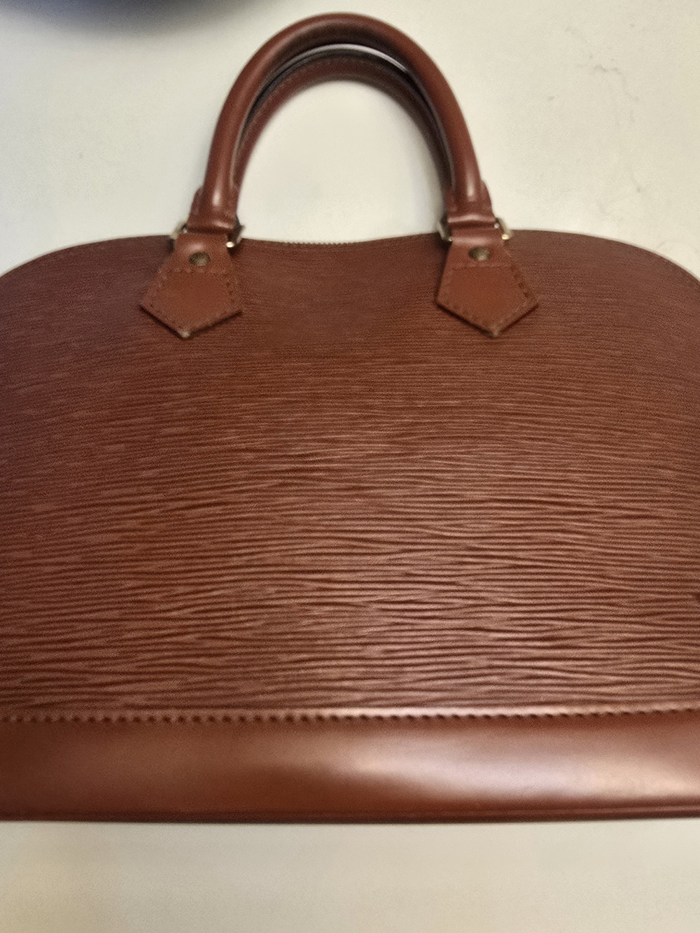 Louis Vuitton Structured Brown Textured Top-Handle Satchel